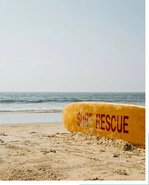 Surf board lying on the beach